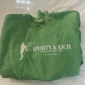 Sporty & Rich “Racquet & Health Club” sweatshirt.
